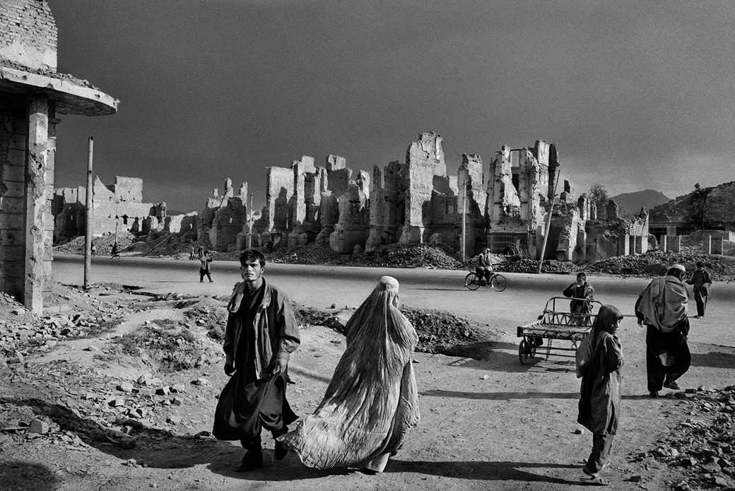 Kabul, Afghanistan (people among ruins)